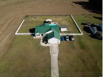 Aerial view of house with pool and large yard; plenty of land surrounding the property at 1916 Winburn St., Conway, SC 29527