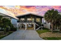 Two-story home with a modern exterior at 324 54Th Ave. N, North Myrtle Beach, SC 29582