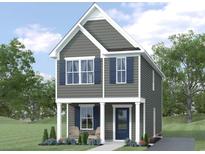 Charming two-story home with gray siding and blue accents at 2725 Rowyn St., Longs, SC 29568