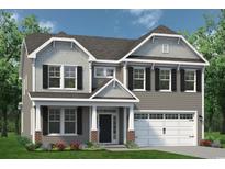 Two-story house with gray siding, white trim, and double garage at 5036 Cambria Ct., Little River, SC 29566