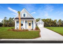 Charming cottage with yellow door and palm tree at 2744 Rowyn St., Longs, SC 29568