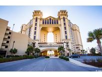 Luxury high-rise building with grand entrance at 100 North Beach Blvd. # 311, North Myrtle Beach, SC 29582