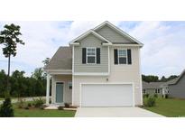 Two-story house with gray and beige siding and a two-car garage at 651 Wallace Dr., Little River, SC 29566
