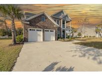 Brick house with two-car garage at 845 Waterton Ave., Myrtle Beach, SC 29579