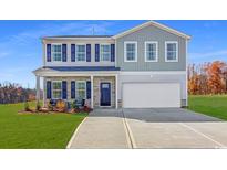 Two-story house with stone and siding exterior at 204 Sundrop Way, Conway, SC 29526
