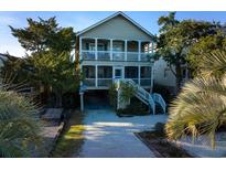 Two story home with a large deck, situated near the water at 241 Atlantic Ave., Pawleys Island, SC 29585