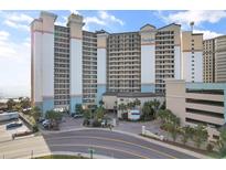 Oceanfront high-rise building with parking and signage at 4800 Ocean Blvd. S # 915, North Myrtle Beach, SC 29582