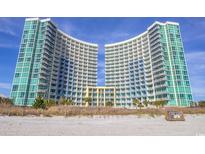 Oceanfront twin towers, featuring a curved design and multiple balconies at 300 N Ocean Blvd. # 1628, North Myrtle Beach, SC 29582