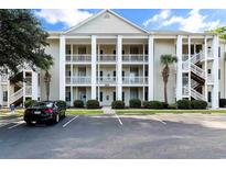 Well-maintained building exterior with ample parking at 6010 Windsor Green Way # 301, Myrtle Beach, SC 29579