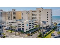 Oceanfront building with parking and nearby beach at 6100 N Ocean Blvd. # 207, North Myrtle Beach, SC 29582