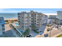 Oceanfront building with parking and pool, close to beach access at 5910 N Ocean Blvd. # 504, North Myrtle Beach, SC 29582