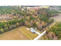 Modern single Gathering home on a large wooded lot at 1200 Bergen Dr., Loris, SC 29569