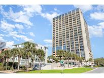 Ocean Forest Plaza building exterior, showcasing a high-rise building and landscaping at 5523 N Ocean Blvd. # 1812, Myrtle Beach, SC 29577