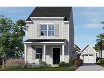 Two-story craftsman style home with gray siding, shutters, and landscaping at 2705 Rowyn St., Longs, SC 29568