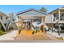 Covered RV pad with spacious deck and parking at 6001 - 5036 S Kings Highway, Myrtle Beach, SC 29575