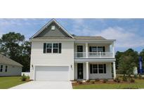 Two-story home with white siding, gray accents, and a front porch at 7072 Shooting Star Way, Myrtle Beach, SC 29579