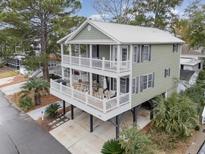 Two-story house with large deck and parking underneath at 6001-Mh119B S Kings Hwy., Myrtle Beach, SC 29575