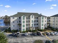 Attractive three-story building with parking and waterfront views at 1100 Commons Blvd. # 716, Myrtle Beach, SC 29572