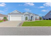 Newly built home with a two-car garage and well-manicured lawn at 360 Hillsborough Dr., Conway, SC 29526