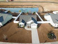 Charming single-story home with fenced backyard and pond views at 179 Springtide Dr., Conway, SC 29527