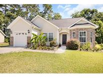 Charming single-story home with a two-car garage and landscaped front yard at 785 Rambler Ct., Myrtle Beach, SC 29579
