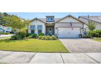 Charming two-story home with landscaped yard and brick driveway at 1854 Orchard Dr., Myrtle Beach, SC 29577