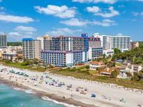 Aerial view of oceanfront hotel and beach at 201 77Th Ave. N # 923, Myrtle Beach, SC 29572