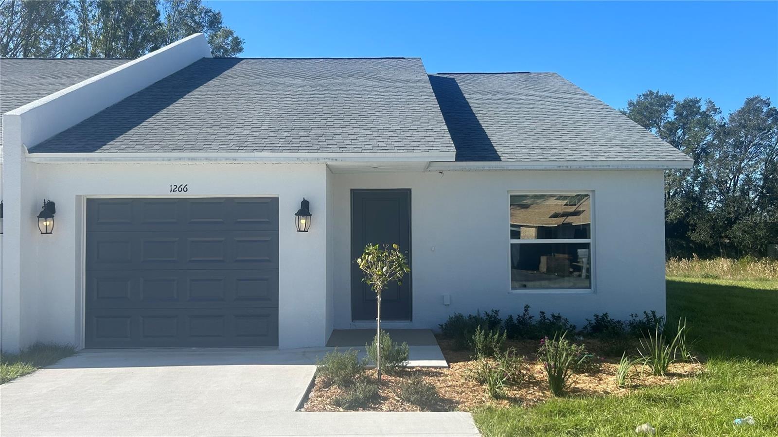 Photo one of 1266 Dosseywood Ln Lakeland FL 33811 | MLS L4948663