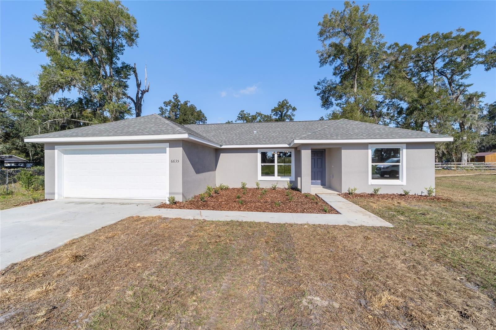 Photo one of 79 Guava Place Dr Ocklawaha FL 32179 | MLS O6120619
