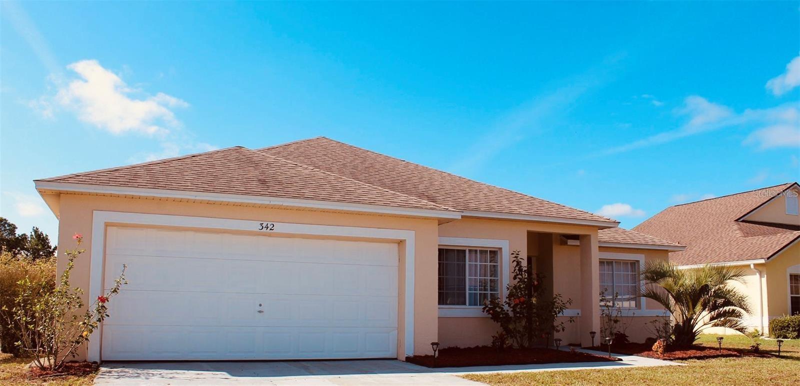 Photo one of 342 Shady Oak Loop Davenport FL 33896 | MLS O6198171