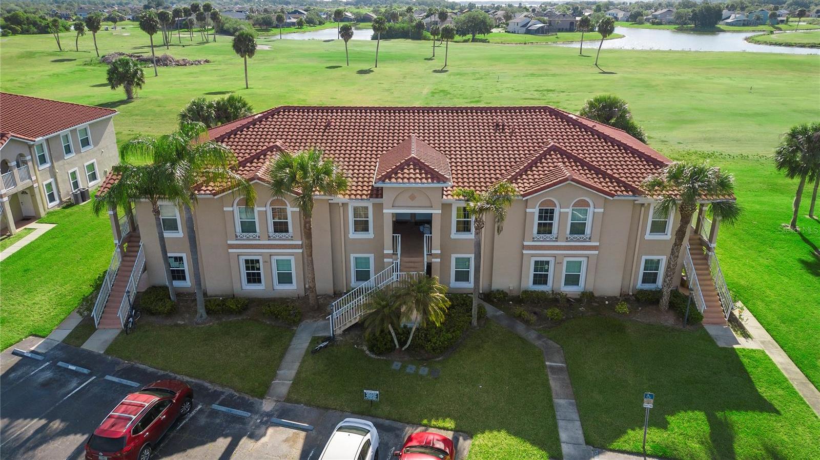 Photo one of 2818 Osprey Cove Pl # 203 Kissimmee FL 34746 | MLS S5103569