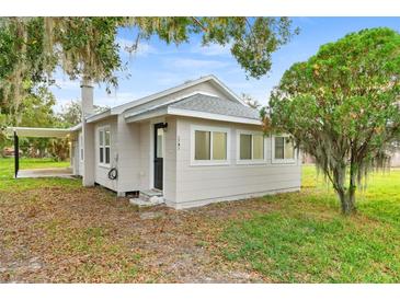 Charming bungalow with a newly renovated exterior and large backyard at 2743 Fletcher Ave, Eaton Park, FL 33840