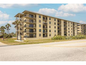 Seabridge North condo building, featuring multiple floors and balconies at 3170 Ocean Shore Blvd # 305, Ormond Beach, FL 32176