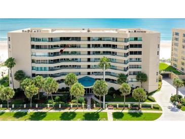 Oceanfront condo building with balconies and lush landscaping at 4525 S Atlantic Ave # 1502, Port Orange, FL 32127