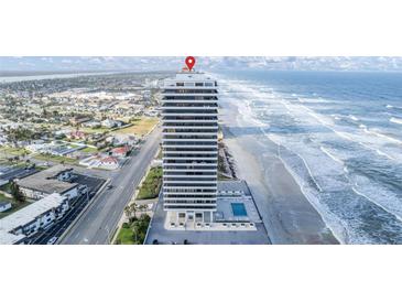 Oceanfront high rise building, pool, and parking at 2200 N Atlantic Ave # 1602, Daytona Beach, FL 32118