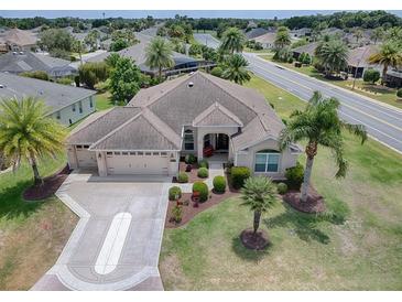 Single-Gathering home with large yard at 1751 Ashwood Run, The Villages, FL 32162