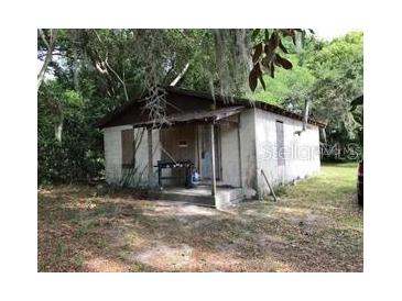 Small, single-story house needing renovations at 1605 Rose Ln, Eustis, FL 32726
