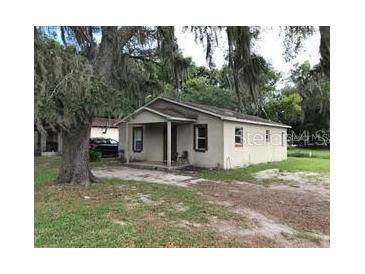 Single story home with covered porch at 1603 Rose Ln, Eustis, FL 32726