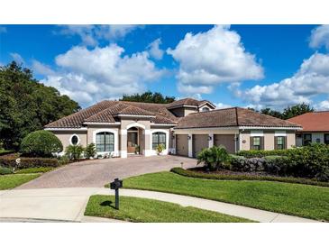 Single Gathering home with tile roof and 3-car garage at 8692 Crested Eagle Pl, Sanford, FL 32771