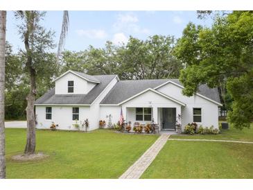 Charming single story home with landscaped yard at 1136 Brick Rd, Winter Garden, FL 34787