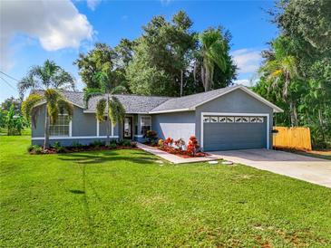 Newly renovated home with a large front yard at 505 Lakeshore Dr, Eustis, FL 32726