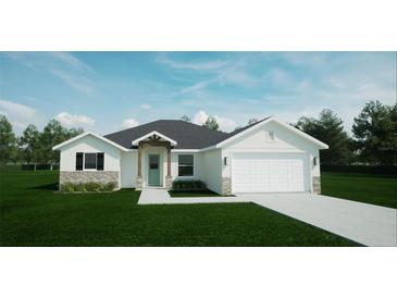 New construction home with modern design and landscaping at 577 Dowling Cir, Lady Lake, FL 32159