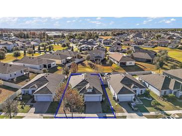 Single-Gathering home in a residential neighborhood with a large yard at 1270 Stratton Ave, Groveland, FL 34736
