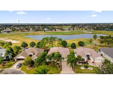 Luxury homes with golf course and lake views at 2176 Blackville Dr, The Villages, FL 32162