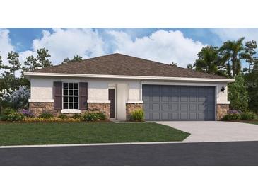 One-story home with gray garage door and brown roof at 2986 Supermarine Rd, Tavares, FL 32778