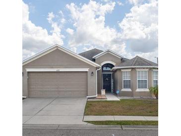 Charming two-story home with a two-car garage at 4722 Harts Brook Ln, Mulberry, FL 33860