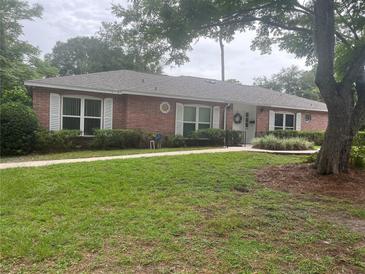 Brick ranch home with mature landscaping at 832 S Hill Ave # 10, Deland, FL 32724