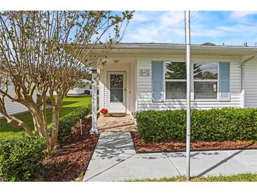 House exterior showcasing walkway, landscaping, and entrance at 1618 Birchwood Loop, Lakeland, FL 33811