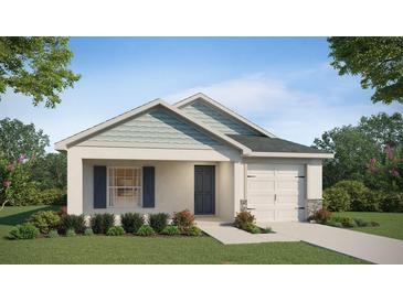 Single-story house with gray siding, dark gray roof, and a two-car garage at 5108 Sylas Jax Ave, Winter Haven, FL 33884
