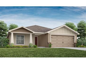 One-story home with neutral siding, two-car garage, and landscaped lawn at 720 Bayside Blvd, Winter Haven, FL 33881